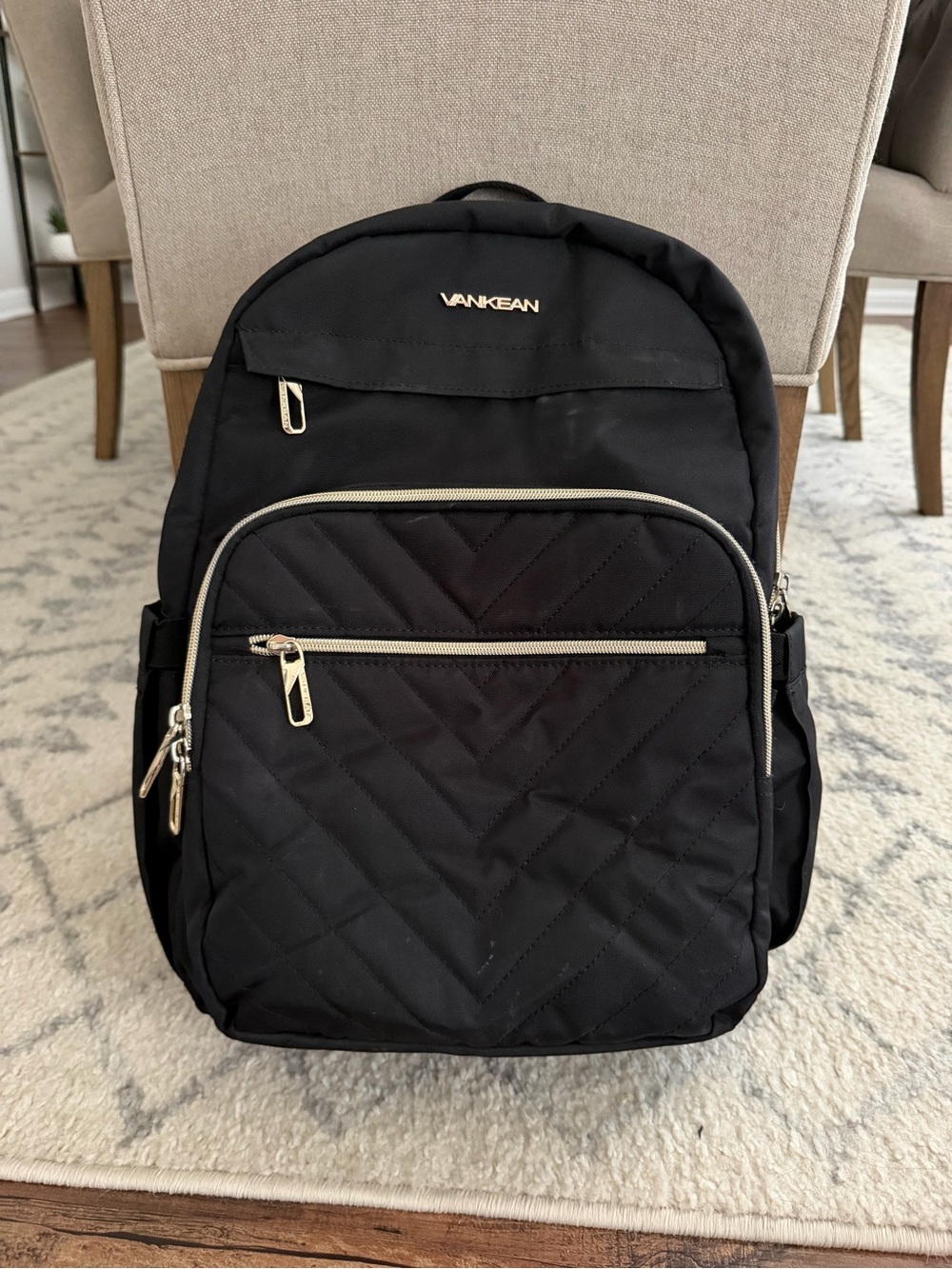 Amazon Black Quilted Backpack with Gold Accents
